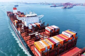 A container ship leaves the port in Qingdao, in Chinas eastern Shandong province on March 6, 2025. (Photo by AFP) / China OUT / CHINA OUT